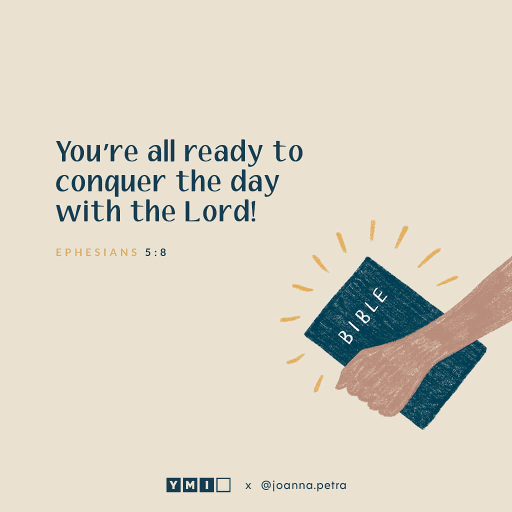 Hand holding bible with quote You're all ready to conquer the day with the Lord!