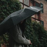 woman holding an umbrella on a rainy day