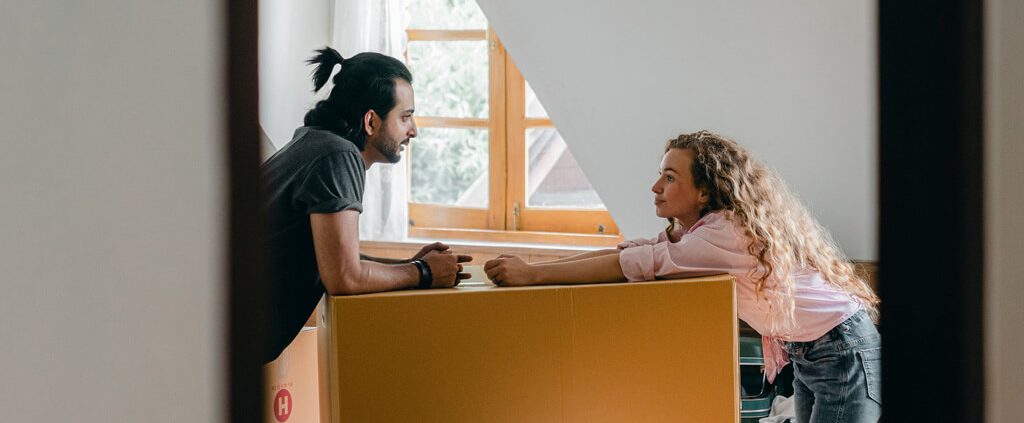 image of a couple in conversation at home