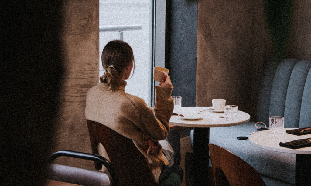 image of a woman in a cafe