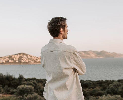 Image of guy looking out to a view