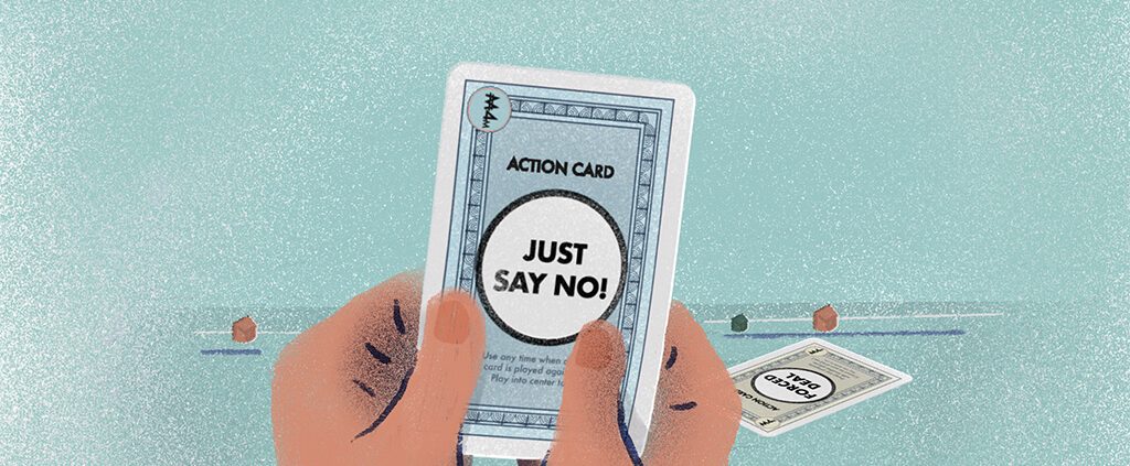 Holding a "JUST SAY NO" card